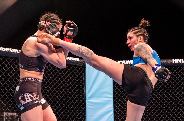 pawfc-women-mma-fighters-in-a-fighting-match.png
